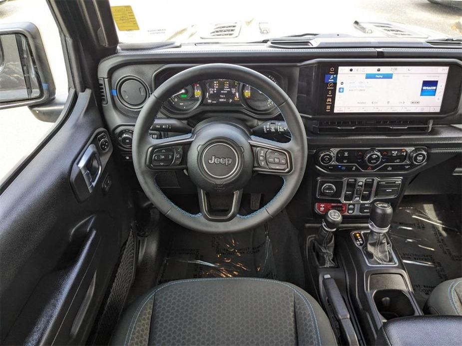 used 2024 Jeep Wrangler 4xe car, priced at $43,113