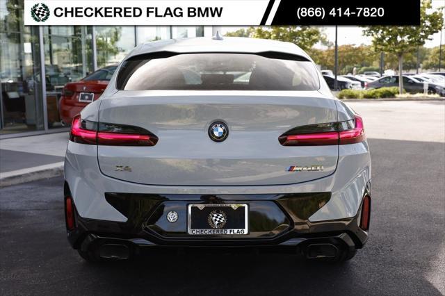 used 2023 BMW X4 car, priced at $57,490