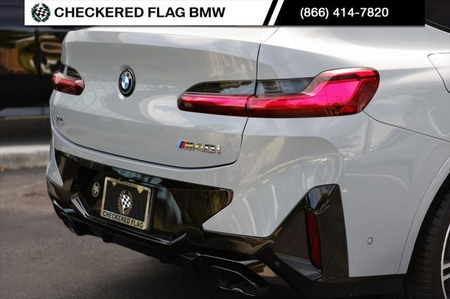 used 2023 BMW X4 car, priced at $57,490