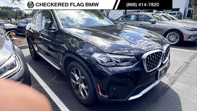 used 2022 BMW X4 car, priced at $38,990