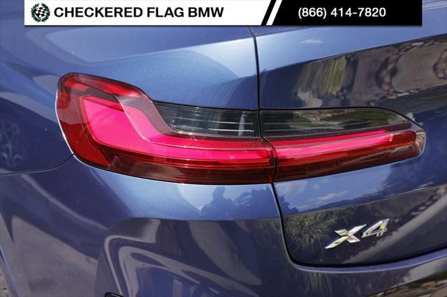 used 2025 BMW X4 car, priced at $55,472