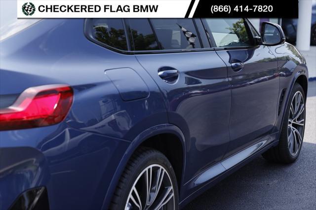 used 2025 BMW X4 car, priced at $55,472