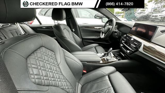 used 2023 BMW 530e car, priced at $42,990