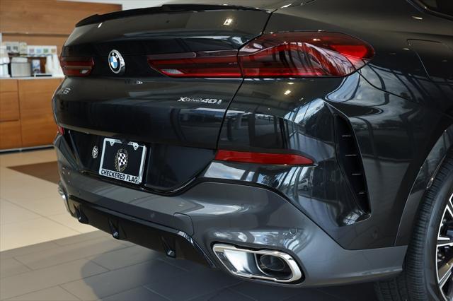 new 2025 BMW X6 car, priced at $77,875