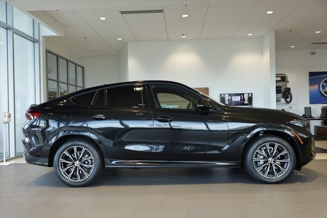 new 2025 BMW X6 car, priced at $77,875