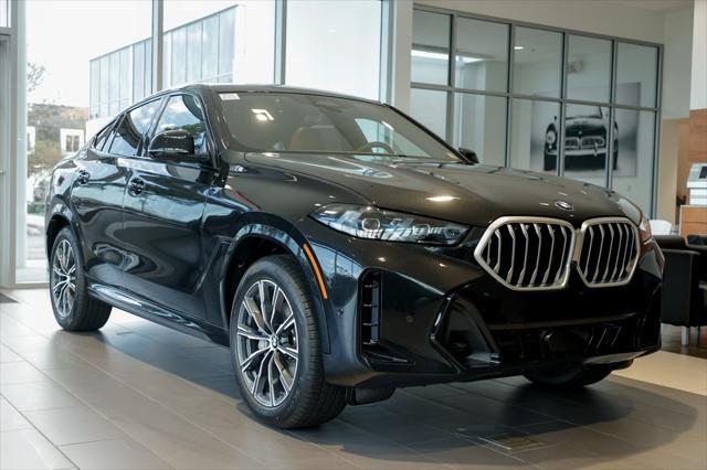 new 2025 BMW X6 car, priced at $77,875