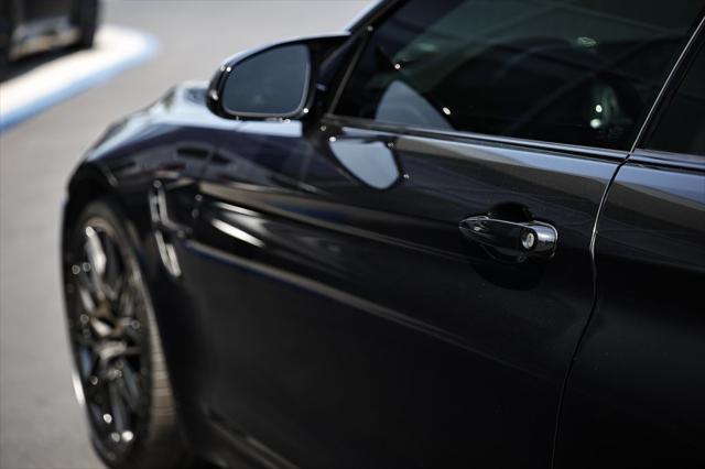 used 2018 BMW M4 car, priced at $55,490