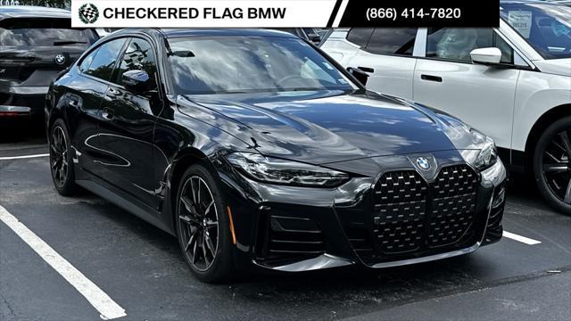 used 2022 BMW M4 car, priced at $53,590