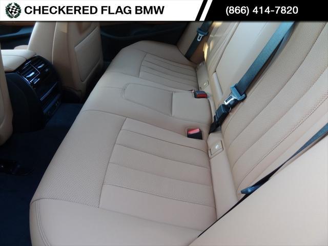 used 2023 BMW 530e car, priced at $47,690