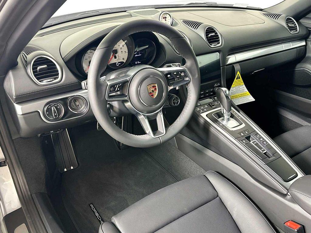 new 2025 Porsche 718 Boxster car, priced at $100,595