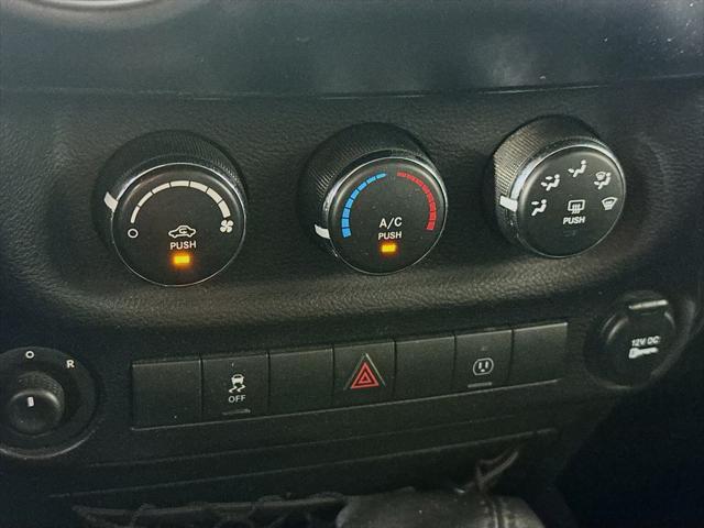 used 2015 Jeep Wrangler Unlimited car, priced at $25,787