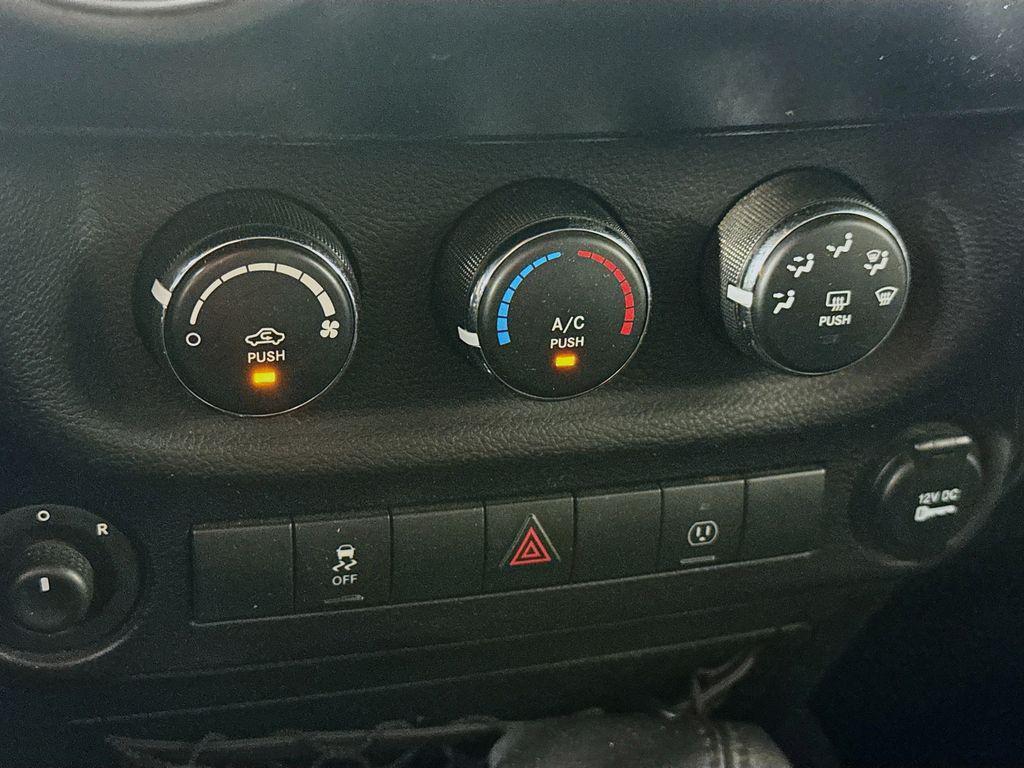 used 2015 Jeep Wrangler Unlimited car, priced at $21,981