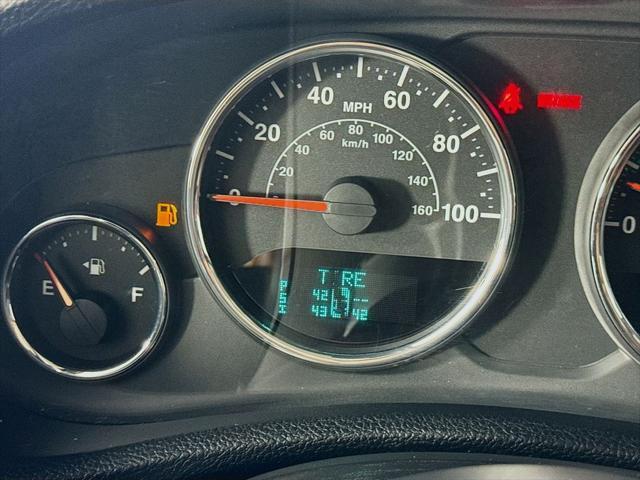 used 2014 Jeep Wrangler Unlimited car, priced at $19,003