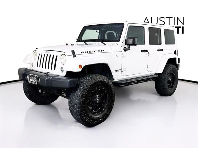 used 2014 Jeep Wrangler Unlimited car, priced at $19,003