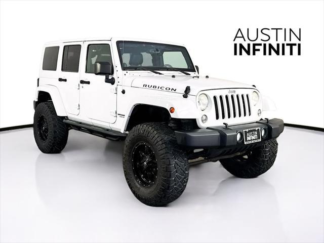 used 2014 Jeep Wrangler Unlimited car, priced at $19,003