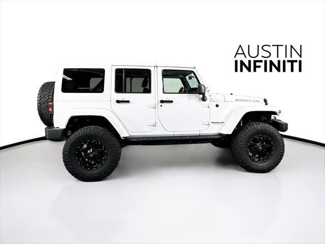 used 2014 Jeep Wrangler Unlimited car, priced at $19,003