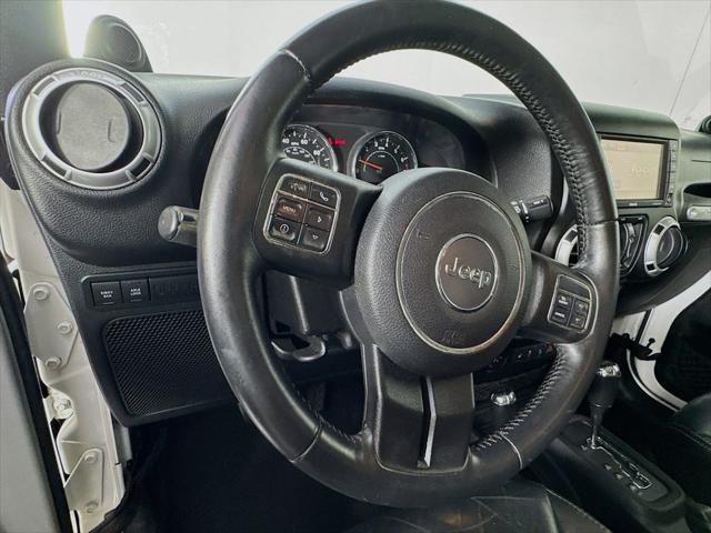 used 2014 Jeep Wrangler Unlimited car, priced at $19,003