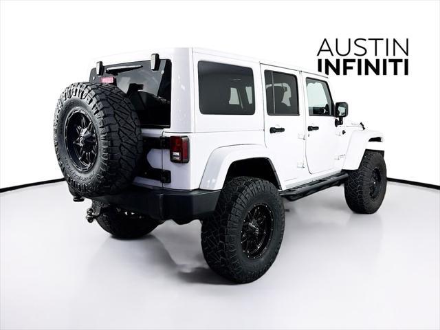used 2014 Jeep Wrangler Unlimited car, priced at $19,003