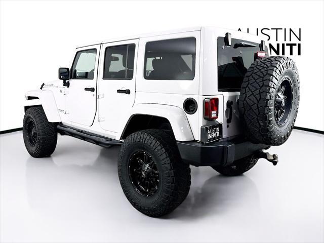 used 2014 Jeep Wrangler Unlimited car, priced at $19,003