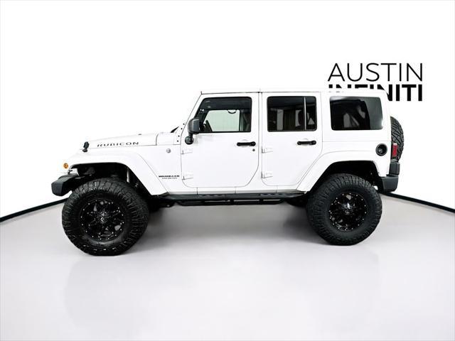 used 2014 Jeep Wrangler Unlimited car, priced at $19,003
