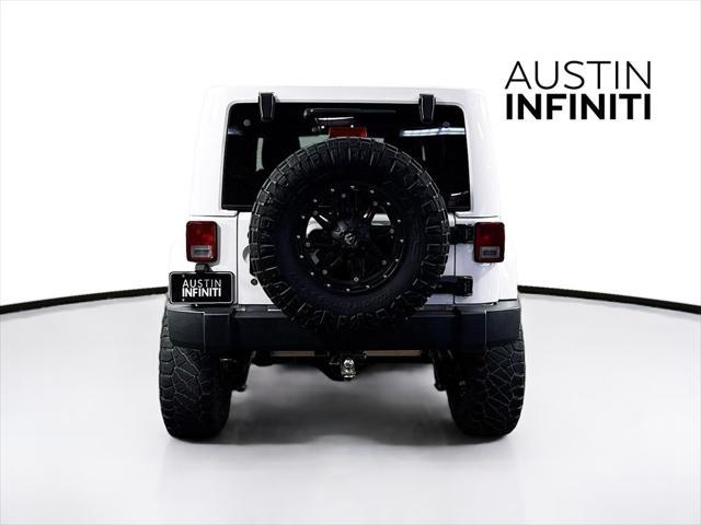 used 2014 Jeep Wrangler Unlimited car, priced at $19,003