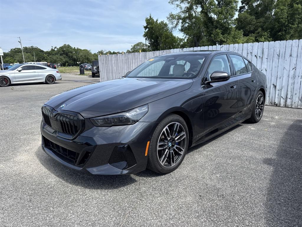 used 2025 BMW 550e car, priced at $62,500