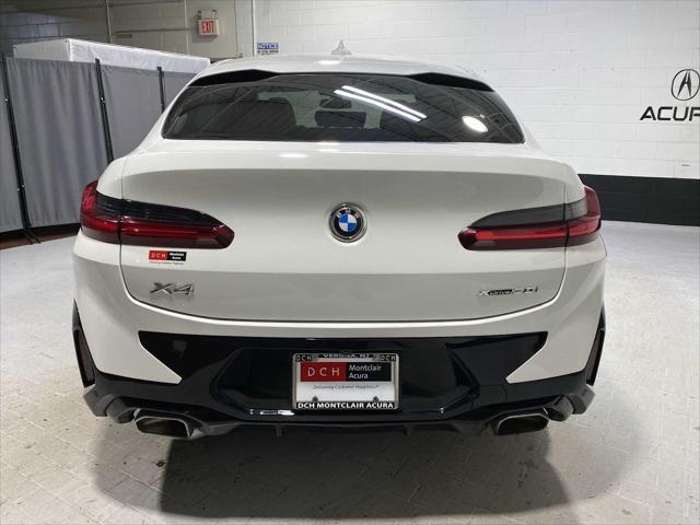used 2022 BMW X4 car, priced at $37,580