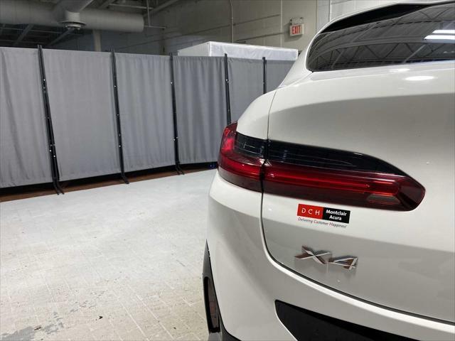 used 2022 BMW X4 car, priced at $37,580