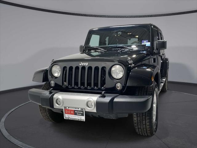 used 2014 Jeep Wrangler Unlimited car, priced at $17,480