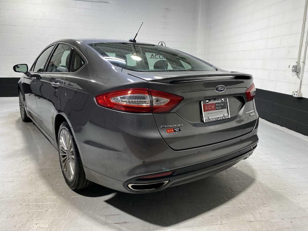 used 2014 Ford Fusion car, priced at $4,980