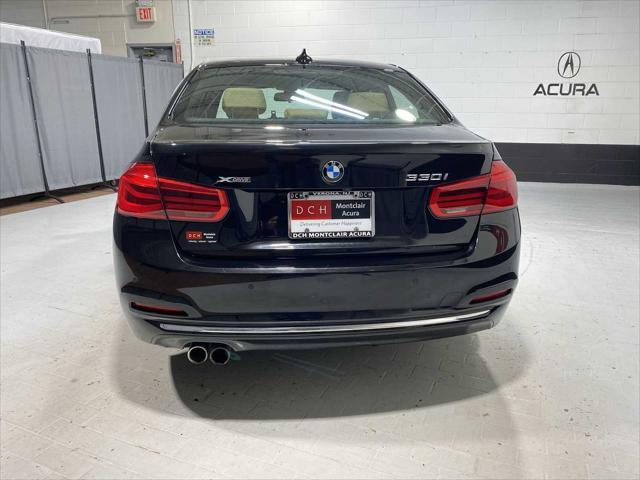 used 2018 BMW 330 car, priced at $18,580