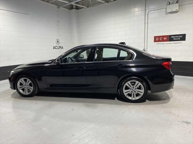 used 2018 BMW 330 car, priced at $18,580