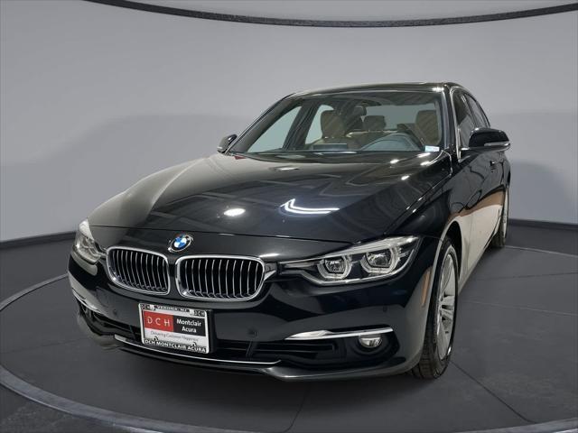 used 2018 BMW 330 car, priced at $18,580