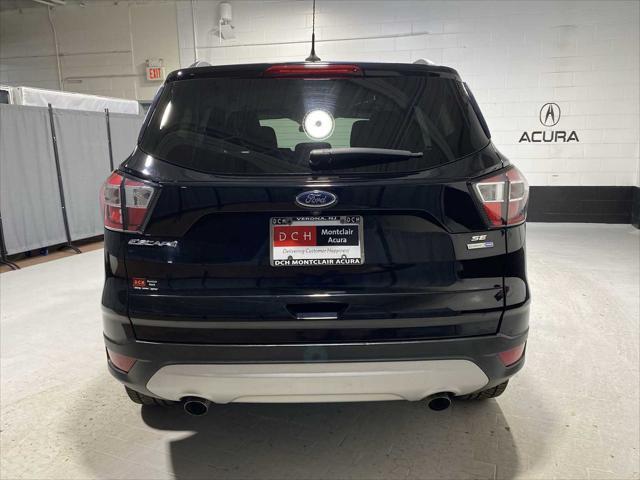 used 2018 Ford Escape car, priced at $13,650