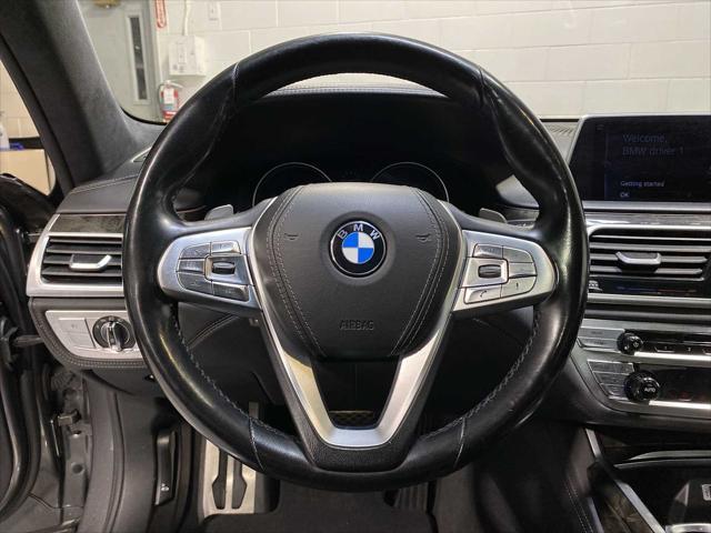 used 2016 BMW 750 car, priced at $16,980