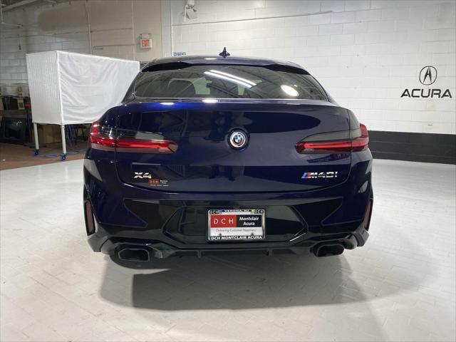 used 2023 BMW X4 car, priced at $55,000