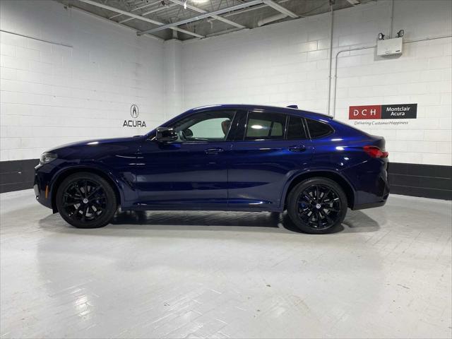 used 2023 BMW X4 car, priced at $55,000