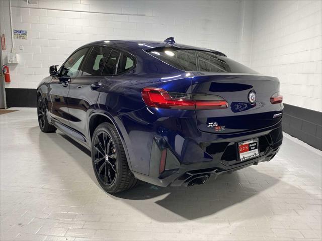 used 2023 BMW X4 car, priced at $55,000