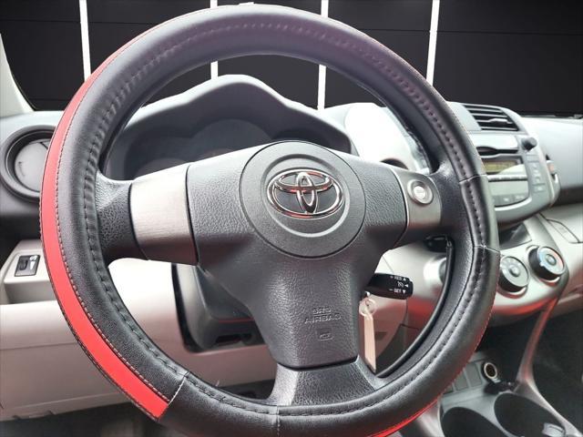 used 2011 Toyota RAV4 car, priced at $9,999