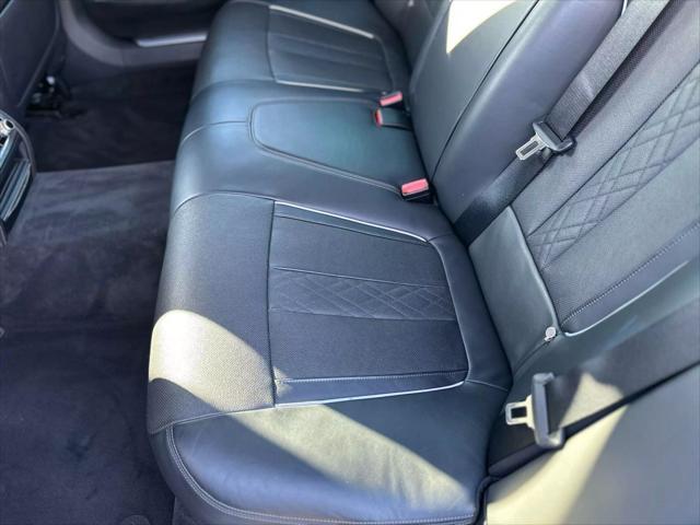 used 2016 BMW 740 car, priced at $16,799