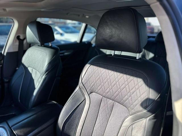 used 2016 BMW 740 car, priced at $16,799