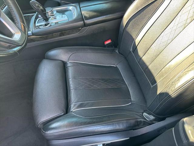 used 2016 BMW 740 car, priced at $16,799