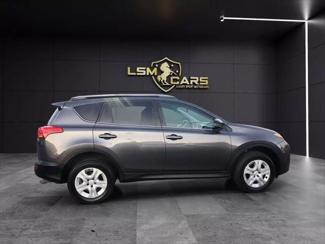 used 2015 Toyota RAV4 car, priced at $9,999