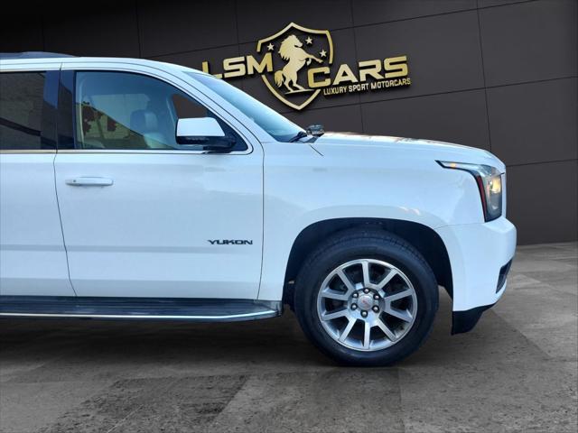 used 2015 GMC Yukon car, priced at $21,999