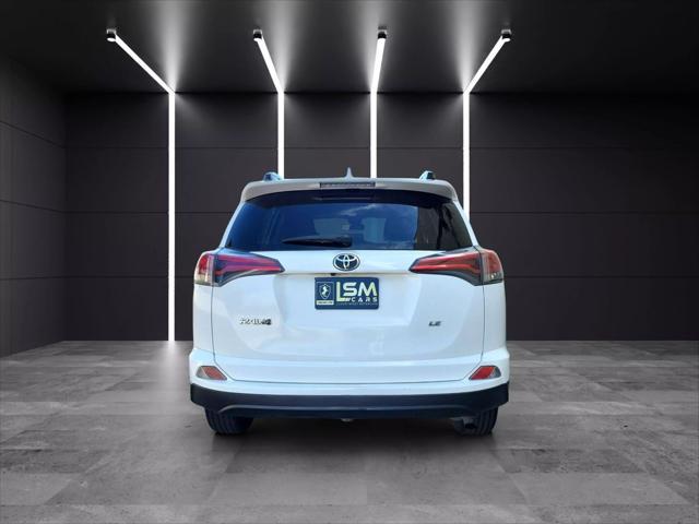 used 2017 Toyota RAV4 car, priced at $9,999