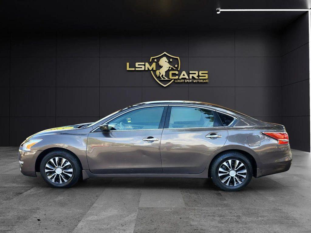 used 2015 Nissan Altima car, priced at $6,999