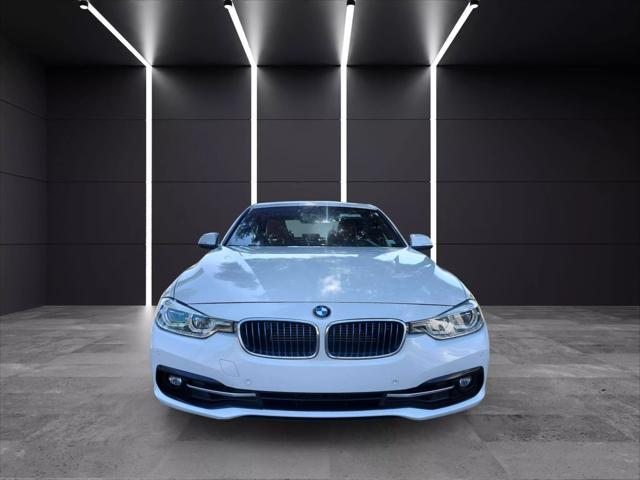used 2017 BMW 330e car, priced at $9,999