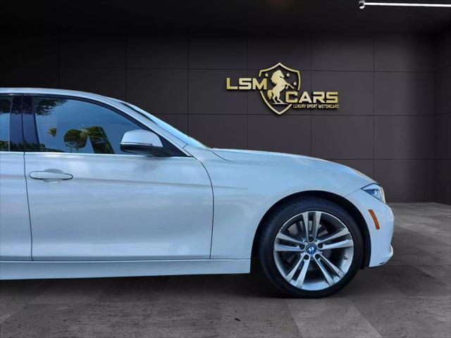 used 2017 BMW 330e car, priced at $9,999