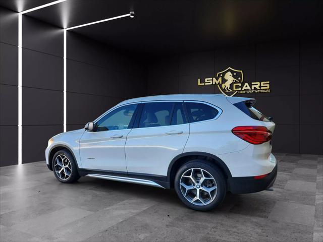 used 2018 BMW X1 car, priced at $9,999