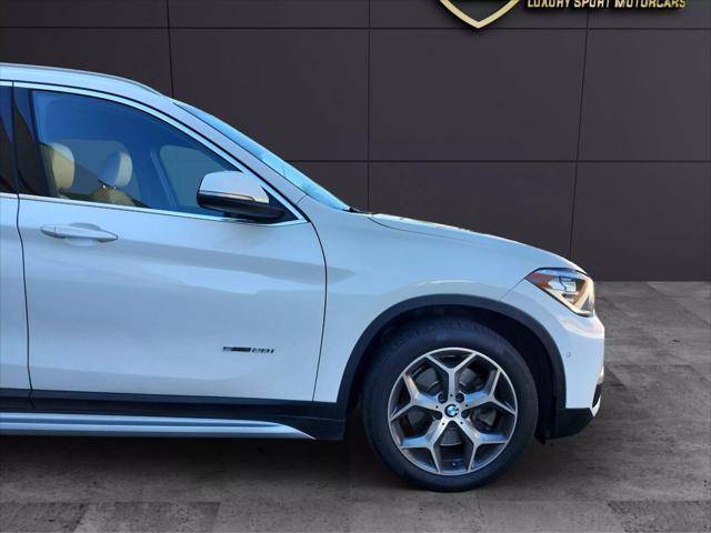 used 2018 BMW X1 car, priced at $9,999